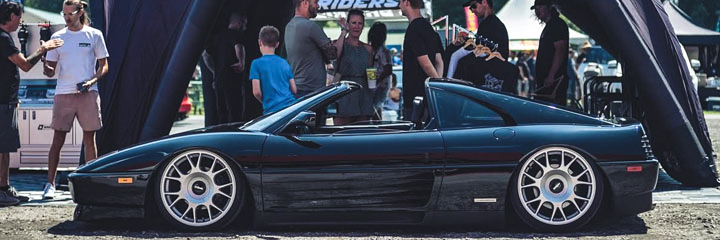 Bag Riders staff helping customers at car show
