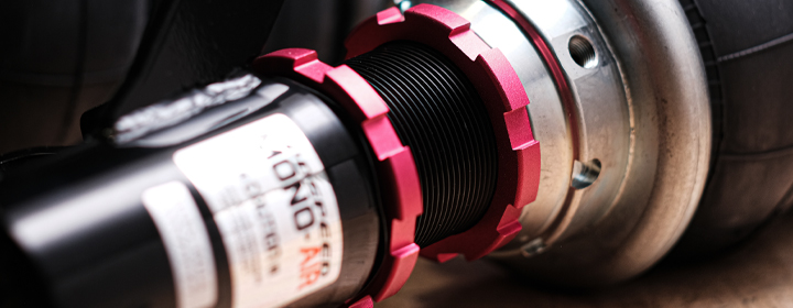 Close up of Godspeed air suspension fully threaded shock bodies