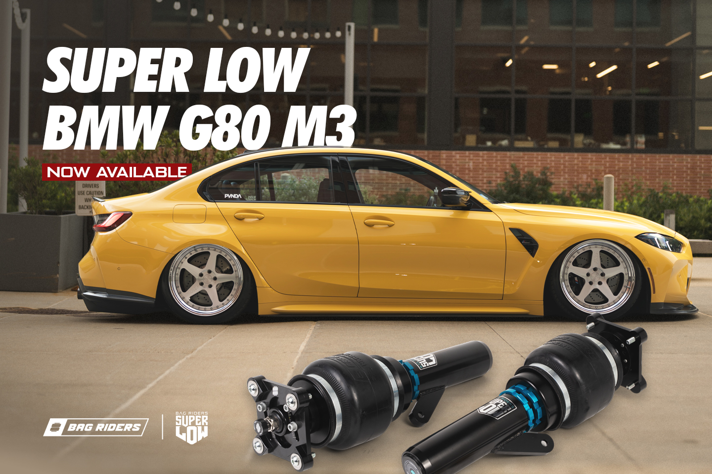 Yellow BMW G80 M3 bagged on Bag Riders Super Low Air Suspension
