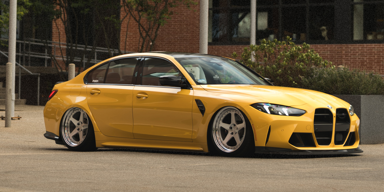 Yellow BMW M3 G80 Bagged on Air Suspension