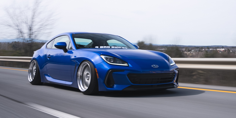 Subaru BRZ on air suspension driving through corners