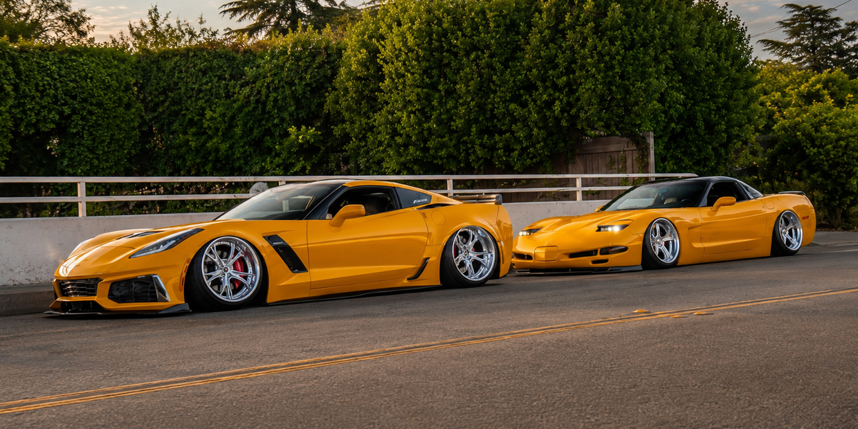 C5 and C6 Corvettes lowered on air suspension with aftermarket wheels