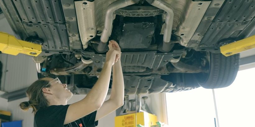 Air suspension line routing and heat protection