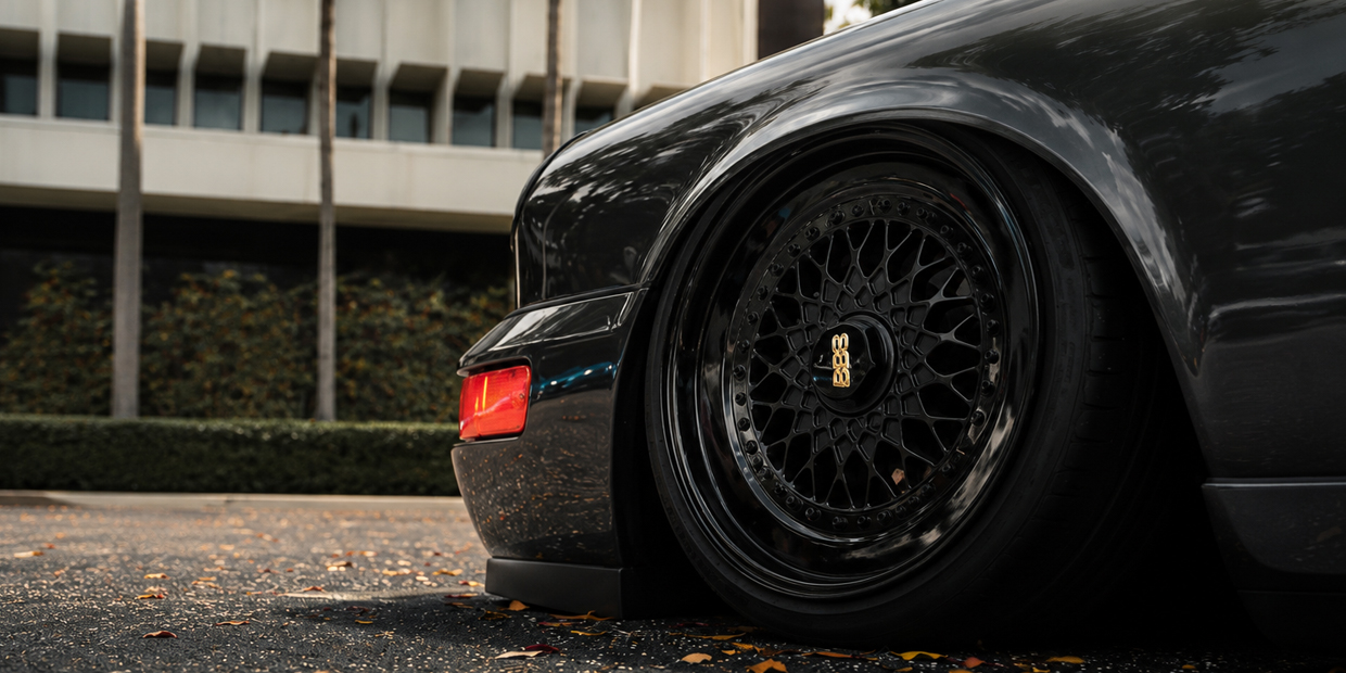 Porsche lowered on air suspension with aftermarket BBS wheels